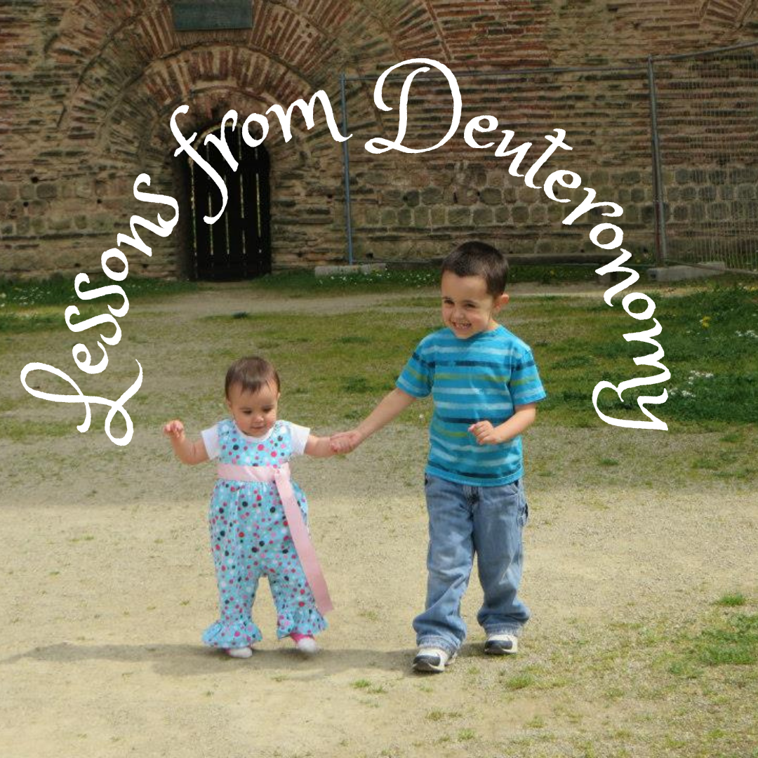Young brother holding his little sister’s hand as they walk together, with “Lessons in Deuteronomy” above them