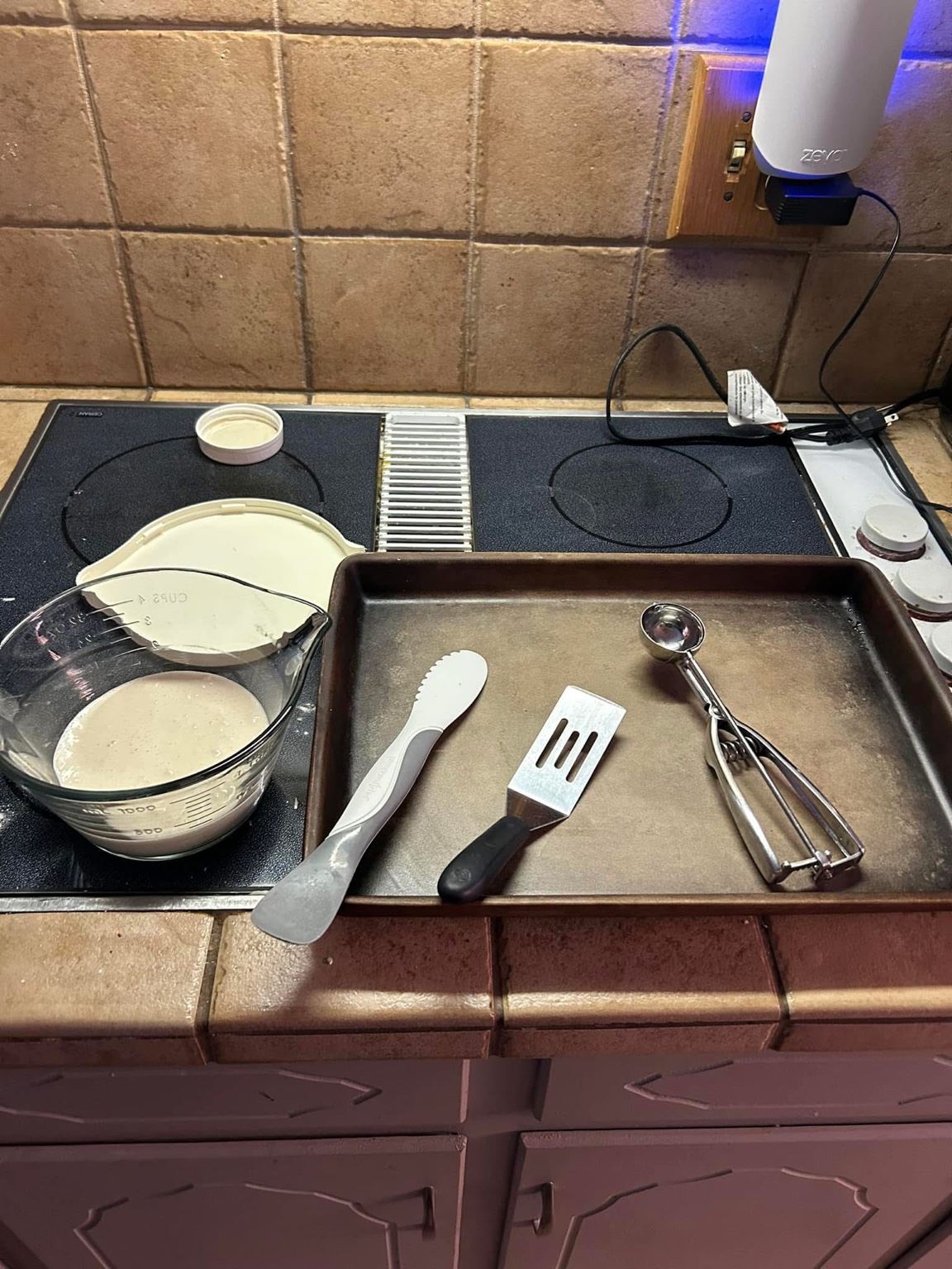 dough and baking tools ready on the kitchen counter before baking