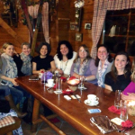 A group of women gathered together around a table during the author's years in Germany.