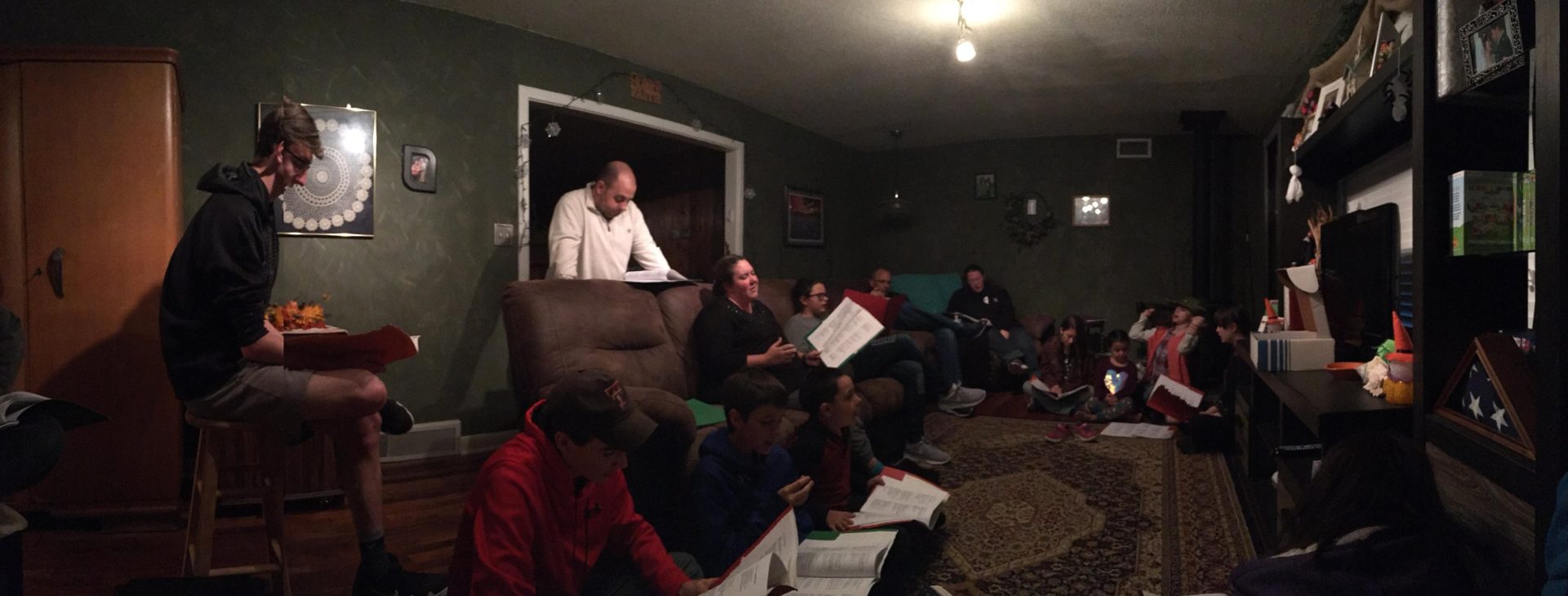 Youth and adults gathered in our living room for a devotional together.