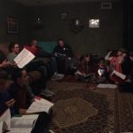 Youth and adults gathered in our living room for a devotional together.