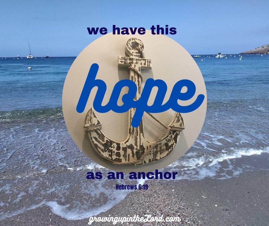 Decorative anchor over an ocean shoreline with the words, “We have this hope as an anchor,” from Hebrews 6:19